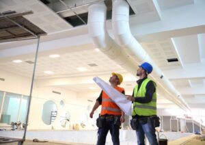 technicians-inspecting-a-new-commercial-HVAC-system