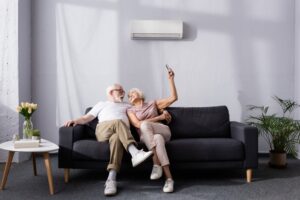 happy-couple-with-a-ductless-mini-split